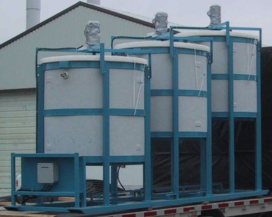 Agitation pilot plant tanks wraped in fibreglass (FRP) for pilot plant leach circuit.