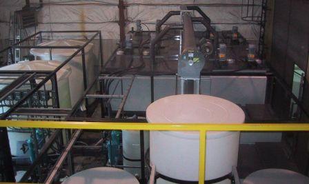 Modular solvent extraction pilot plant complete with mixer-settlers, feed tanks, coalescer, organic tank, crud treatment, and process control instrumentation.