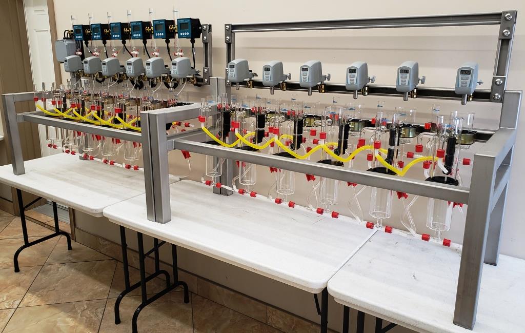 Lab scale SX pilot plant with pH control.