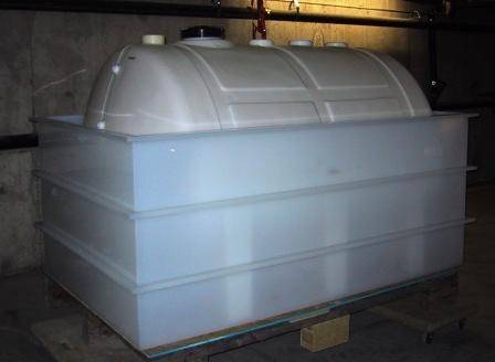 Holding tank with secondary containment.